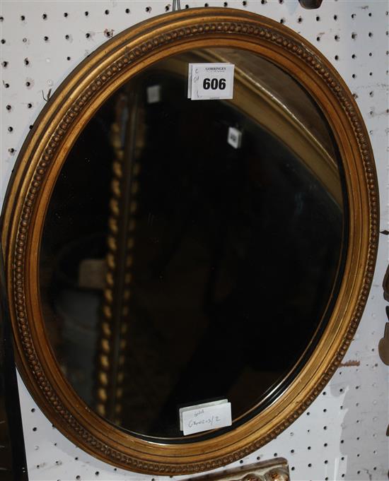 Gilt oval wall mirror